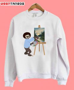 happy guy painting sweatshirt